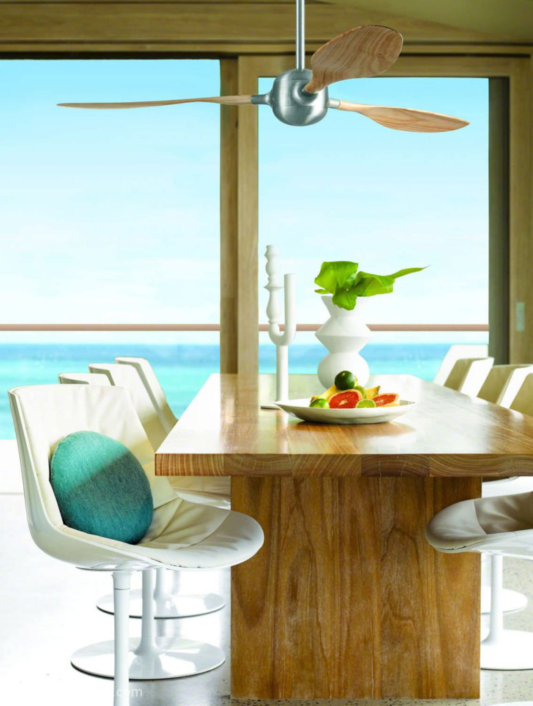 Lucci Woody ceiling fan in conservatory by sea